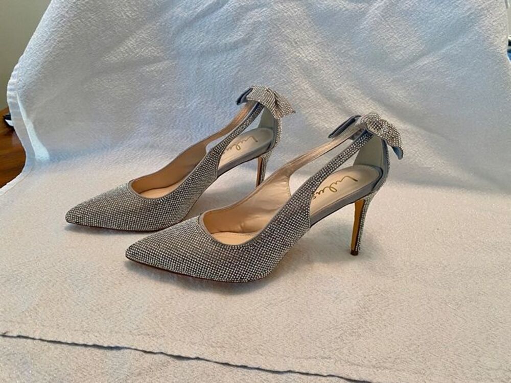 Lulus silver rhinestone heels with bows. Size 10